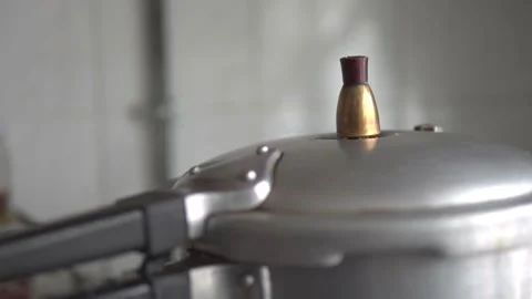 Cooking in a pressure cooker Stock Footage 170422772