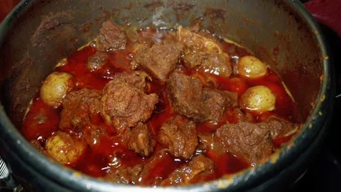 Cooking process of Beef Rendang, an Indonesian food from Padang, West Sumatra Stock Footage 305307528