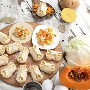 Cooking process. Dumplings stuffed with pumpkin, potato and cabbage. Convenience Stock Photos