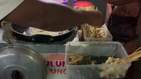 The cooking process of Egg Rolls (Telur Gulung) Stock Footage 214594226