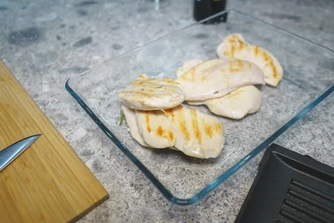 Cooking process for fresh turkey breast: Protein-rich meat is fried. Stock Photos
