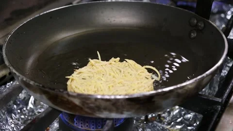 Cooking process of golden brown hash bro... | Stock Video | Pond5