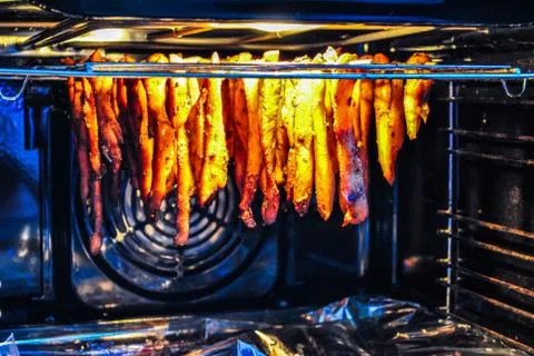 Cooking process of grilled chicken chips Stock Photos
