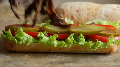 Cooking process making roast beef sandwich with tomato and salad Stock Footage 89966203