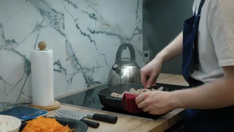 Cooking Process in Modern Kitchen Stock Footage 308487709