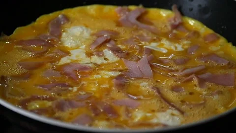 Cooking process of the omelette - slow motion Stock Footage 97351004