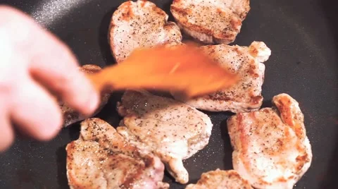 Cooking process of a red organic meat, on a sizzling frying pan, home cook Stock Footage 65449189