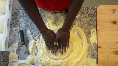 Cooking process showing a chef crafting a delicious homemade pizza step by st 写真素材