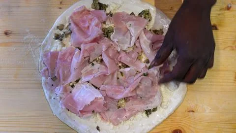 Cooking process showing a chef crafting a delicious homemade pizza step by st 写真素材