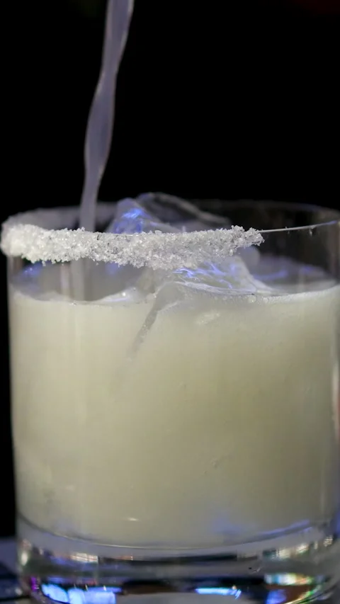Cooking process Step by step Close up of a professional bartender is mixing gin Stock Footage 295158394