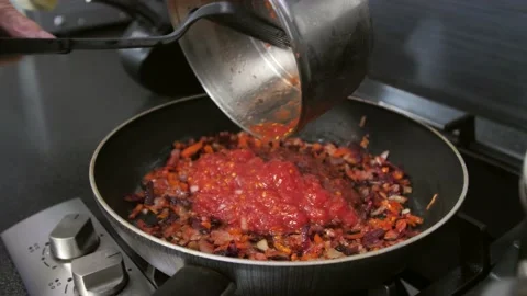 Cooking process, stirring vegetables in tomato sauce. healthy food, vegetarian Stock Footage 205387068