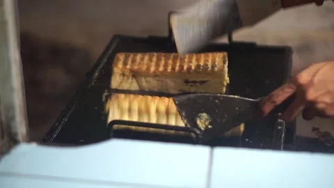 Cooking process of thick grilled bread with brown color and crispy 動画素材 333973424