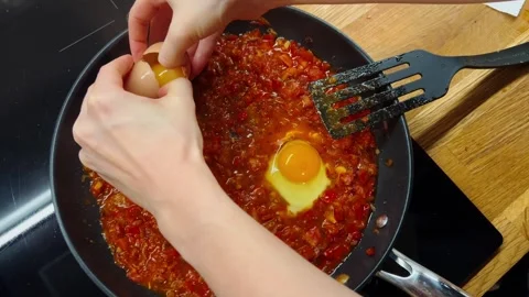 Cooking process with vegetables and eggs, cooking step by step to create a Stock Footage 302834752