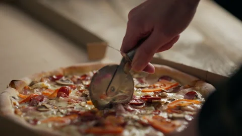 Cooking, Professional chef cooks Responsibly Slicing with a metal circular k Stock Footage 236709093