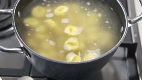 Cooking pumpkin gnocchi in a boiling pot 動画素材 146874565