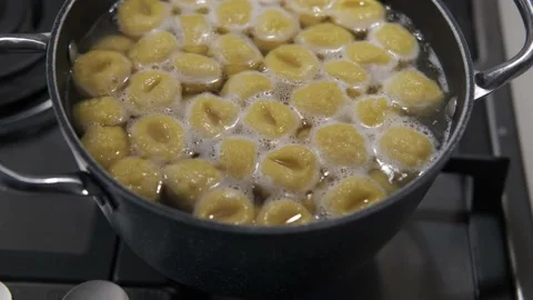 Cooking pumpkin gnocchi in a boiling pot 動画素材 146875290