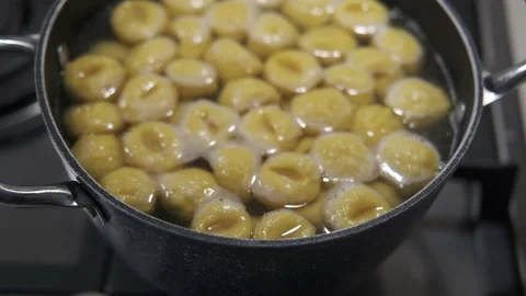 Cooking pumpkin gnocchi in a boiling pot 動画素材 146875426