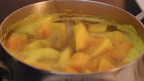 Cooking pumpkin soup, process of cooking vegetable cream soup. Stock Footage 236400873