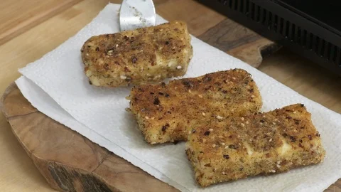 Cooking: Putting A Crispy Fried Snack Stick On Kitchen Paper To Drip Out Fat 스톡 동영상 118597398