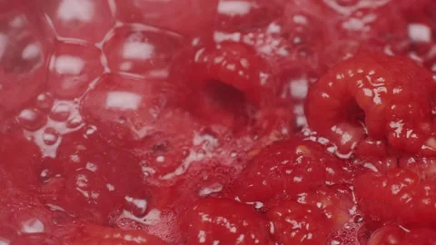 Cooking raspberry berrie jam with sugar, boiling marmalade, Jar of raspberry jam Stock Footage 296014163