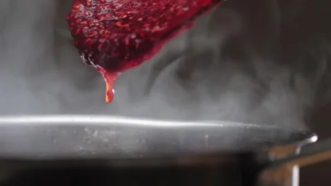 Cooking raspberry berrie jam with sugar, boiling marmalade, Jar of raspberry jam Stock Footage 296014182