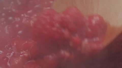 Cooking raspberry berrie jam with sugar, boiling marmalade, Jar of raspberry jam Stock Footage 296014212