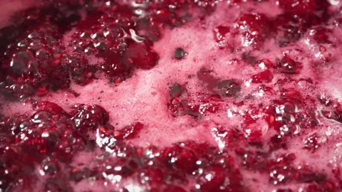 Cooking raspberry jam. Boling raspberry fruits for jam close up Stock-Footage 247054867