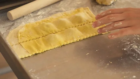 Cooking ravioli by hand Video stock 86853111