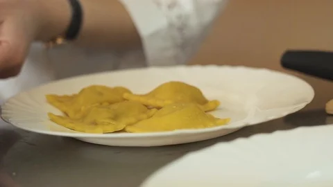 Cooking ravioli by hand Stock Footage 86853365