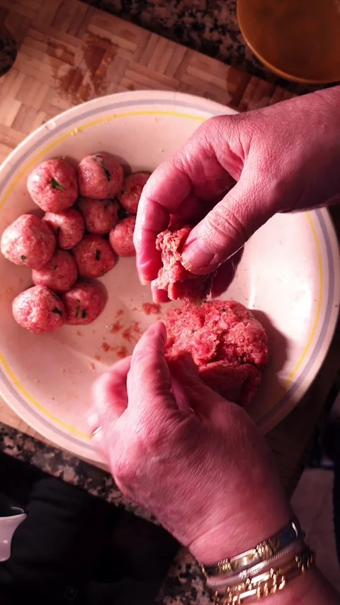 Cooking raw meatballs. Stock Footage 345041368