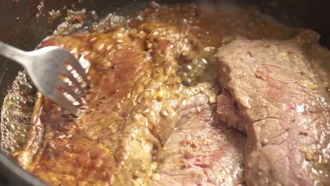 Cooking Raw Steak in pan. Close up. Stock Footage 80462614