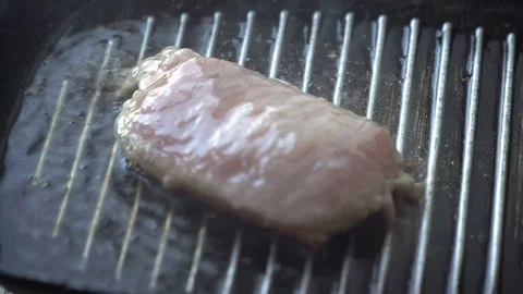 Cooking raw steak on the pan. Video stock 88614570