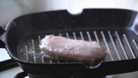 Cooking raw steak on the pan. Stock Footage 88667512