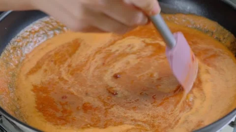 Cooking Red Beans and Spices in a Pan on Stovetop Stock Footage 341438464