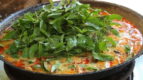 Cooking  red curry  in  pan, Thai famous food. Stock Footage 112598932