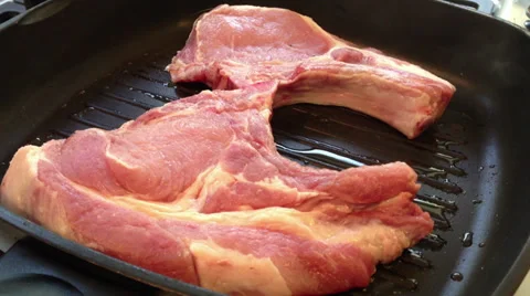 Cooking red meat steaks Stock Footage 27343764