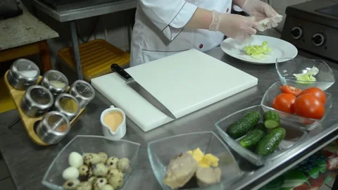Cooking in a restaurant kitchen as a chef Stock Footage 326958167
