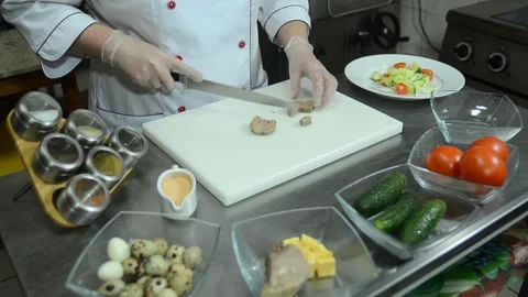 Cooking in a restaurant kitchen as a chef Stock Footage 326958307