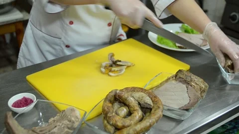 Cooking in a restaurant kitchen as a chef Stock Footage 326958885