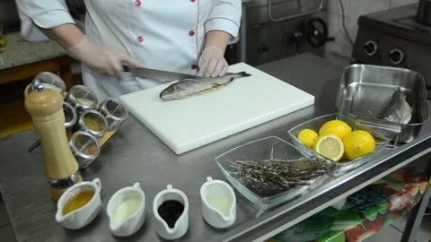 Cooking in a restaurant kitchen as a chef Stock Footage 326959051