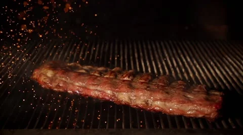 Cooking ribs in slow motion Stock Footage 67867127