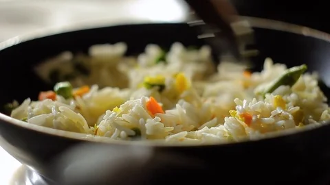 Cooking Rice basmati with vegetables in a pan, HD footage 動画素材 72965291