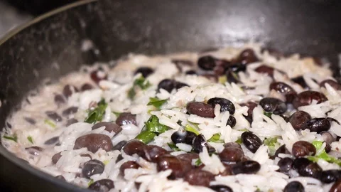 Cooking rice with beans for a healthy lunch Stock Footage