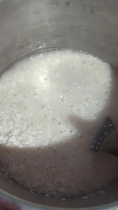 Cooking rice Stock Footage 287499136