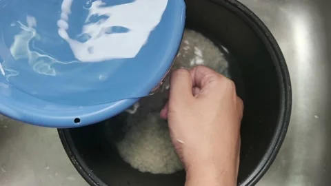 Cooking rice at home Stock Footage 135739657