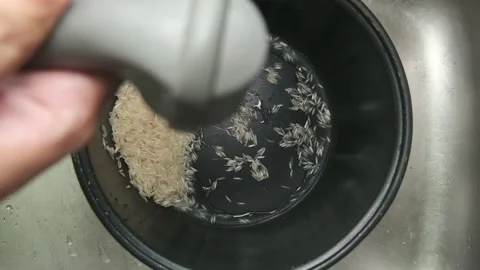 Cooking rice at home Stock Footage 135742604