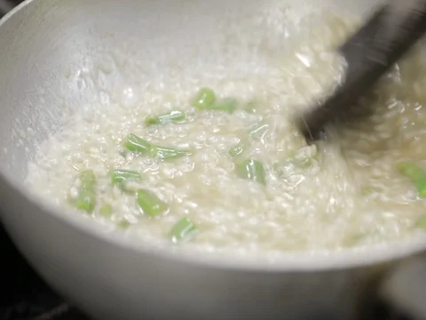 Cooking rice in a pan Stock Footage 80631115