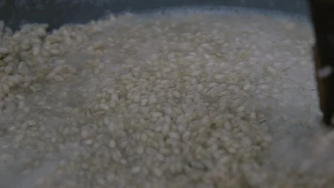 Cooking rice in a pot Stock Footage 87749441