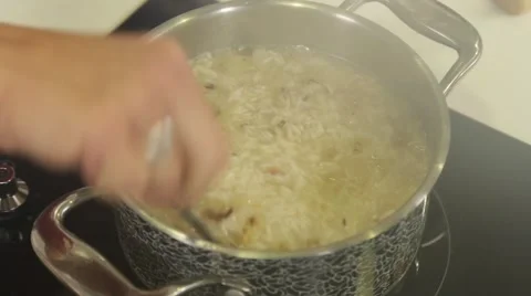 Cooking a rise soup Stock Footage 49782808