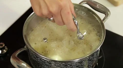 Cooking a rise soup Stock Footage 49782914